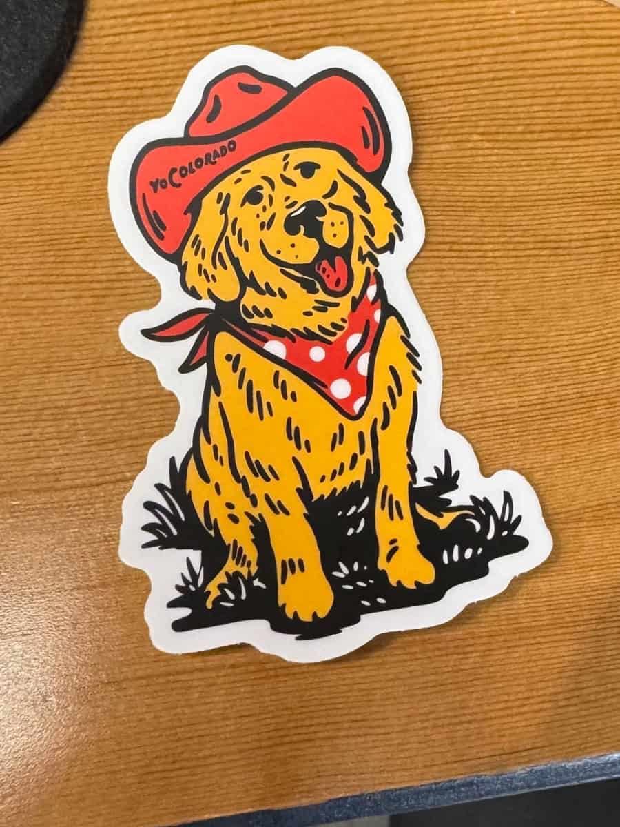 Close-up of an official Goldens in Golden sticker.
