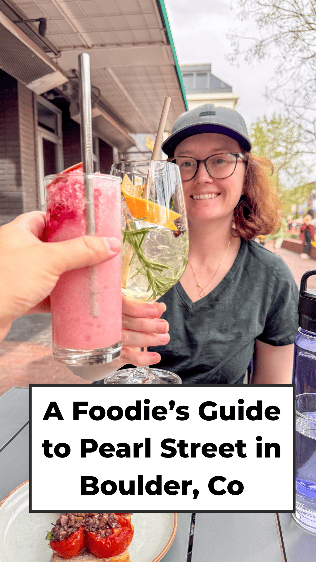 Kathryn holding up a Gin and Tonic in Boulder, Colorado