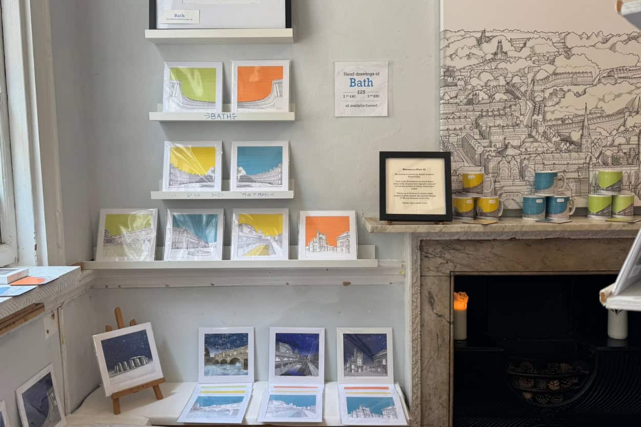 Architectural illustrations on display inside Pitch26, a unique stop among things to do in Bath, England