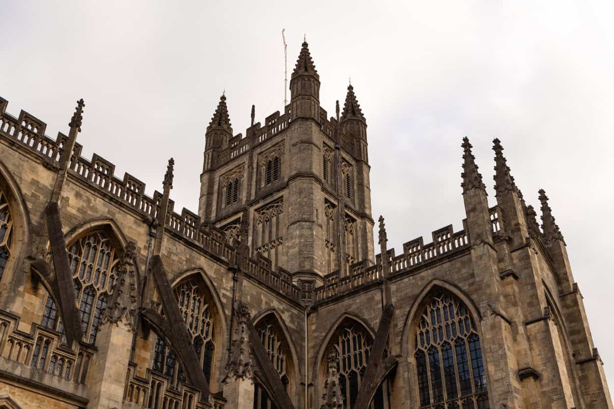 Looking up at the bell tower of Bath Abbey, one of the top sights on a Bath walking tour