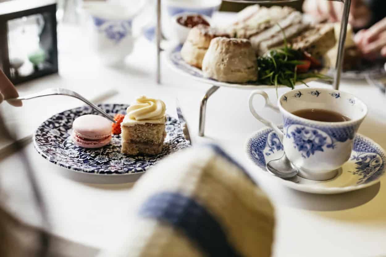 Cakes, macaron, and tea served at The Regency Tea Room in Bath, England