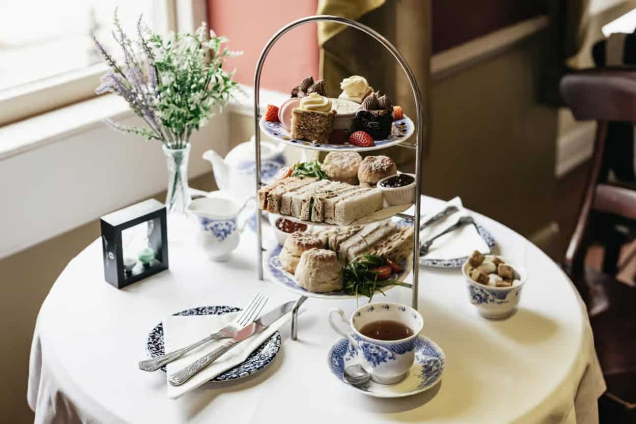 Full afternoon tea tower with finger sandwiches and clotted cream at The Regency Tea Room, Bath