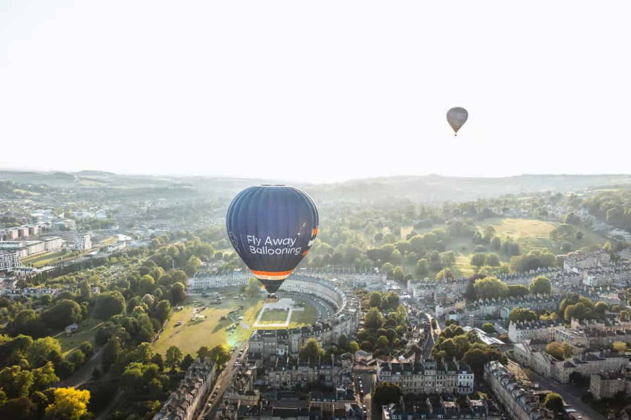 Hot air balloon flying over Bath, England