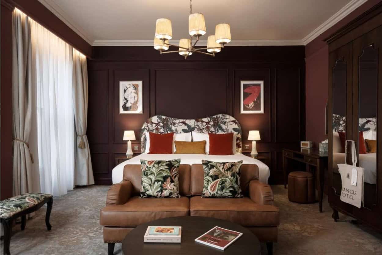 Bed inside the John Wood Suite at The Francis Hotel in Bath, England