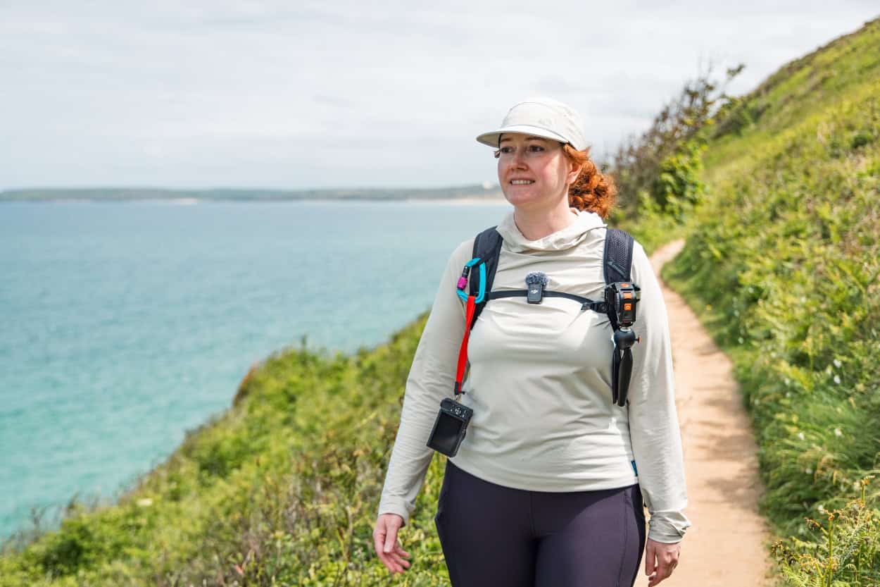 Katie walking along a coastal path near St. Ives in England