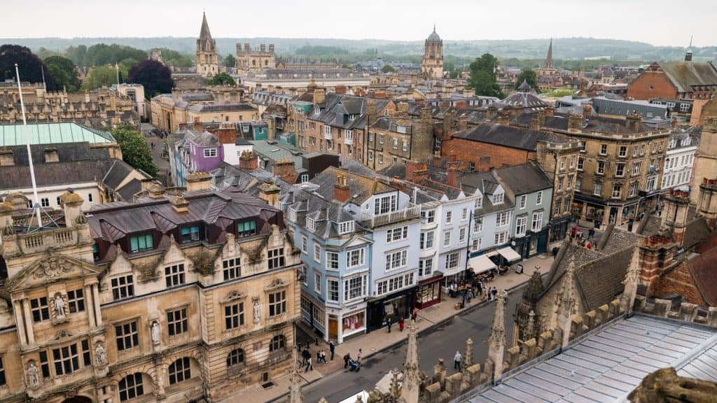 View from St. Mary's Church Tower looking over Oxford city center rooftops and spires