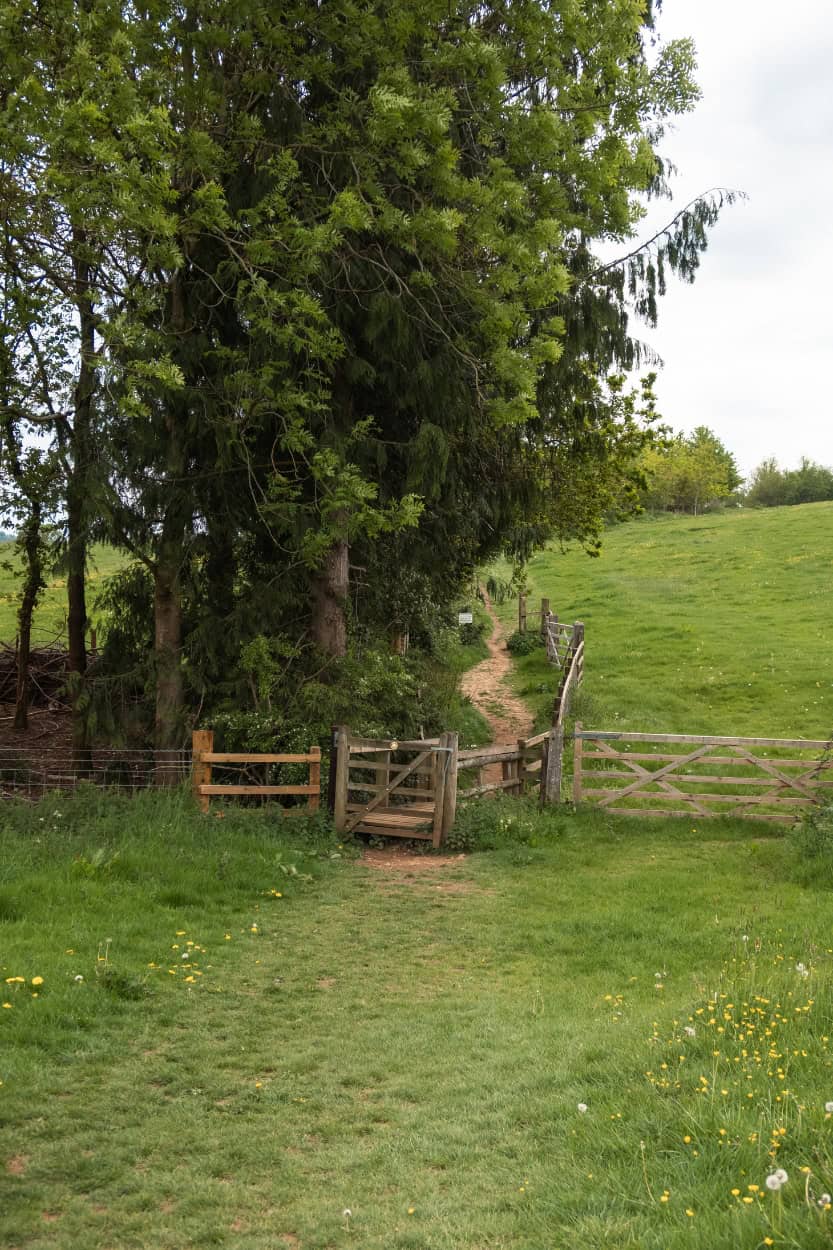 Steep path and kissing gate near Sezincote House walking the Cotswolds near Moreton-in-Marsh