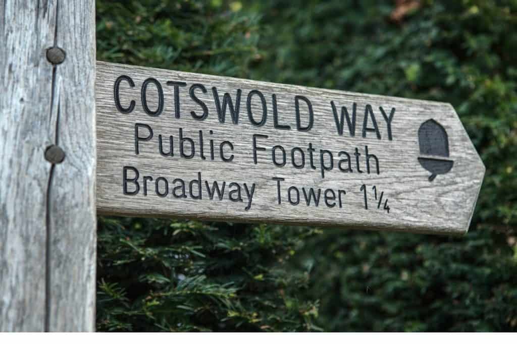 Wooden Cotswold Way public footpath signpost near Broadway Tower walking the Cotswolds England
