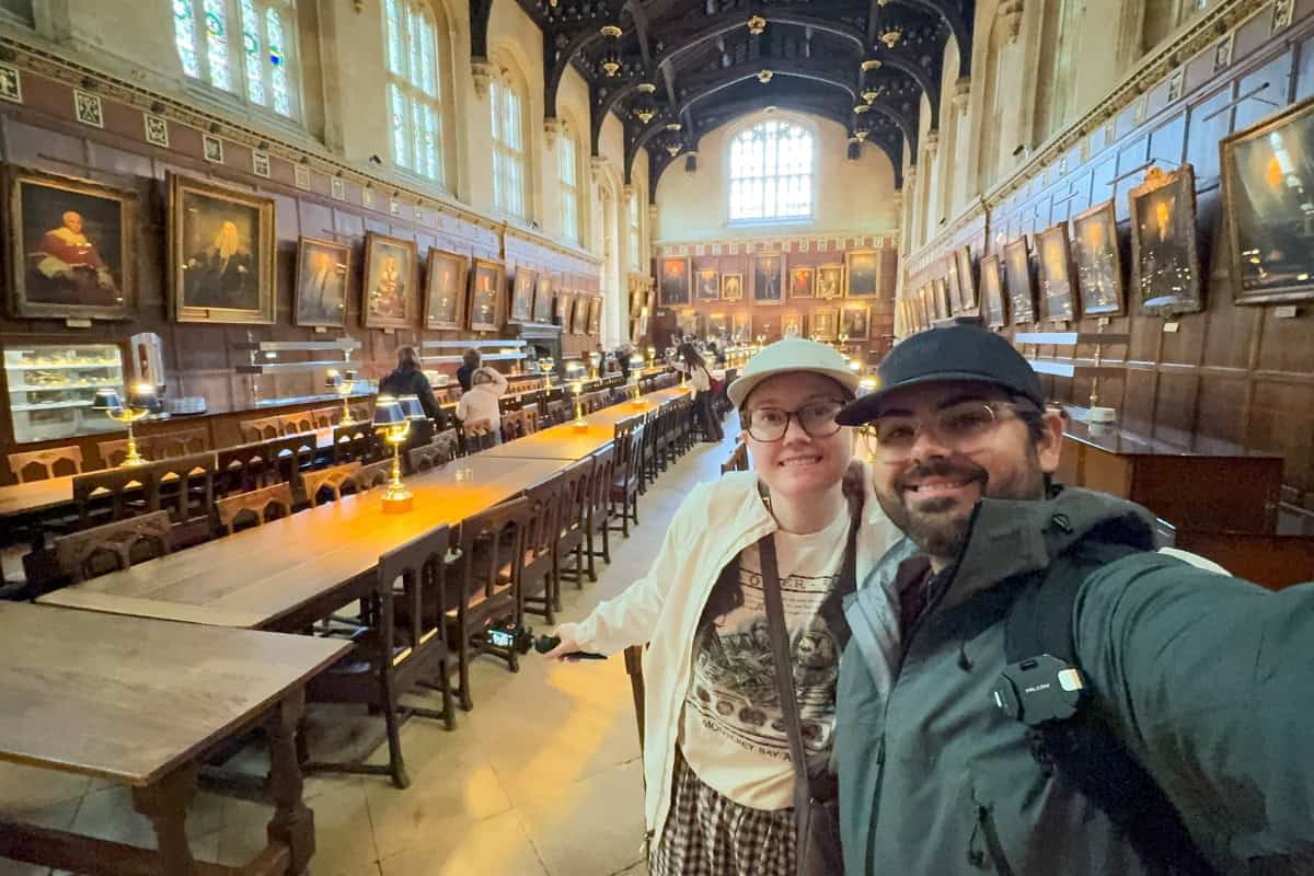 Katie and Joey standing inside the Great Hall at Christ Church College Oxford