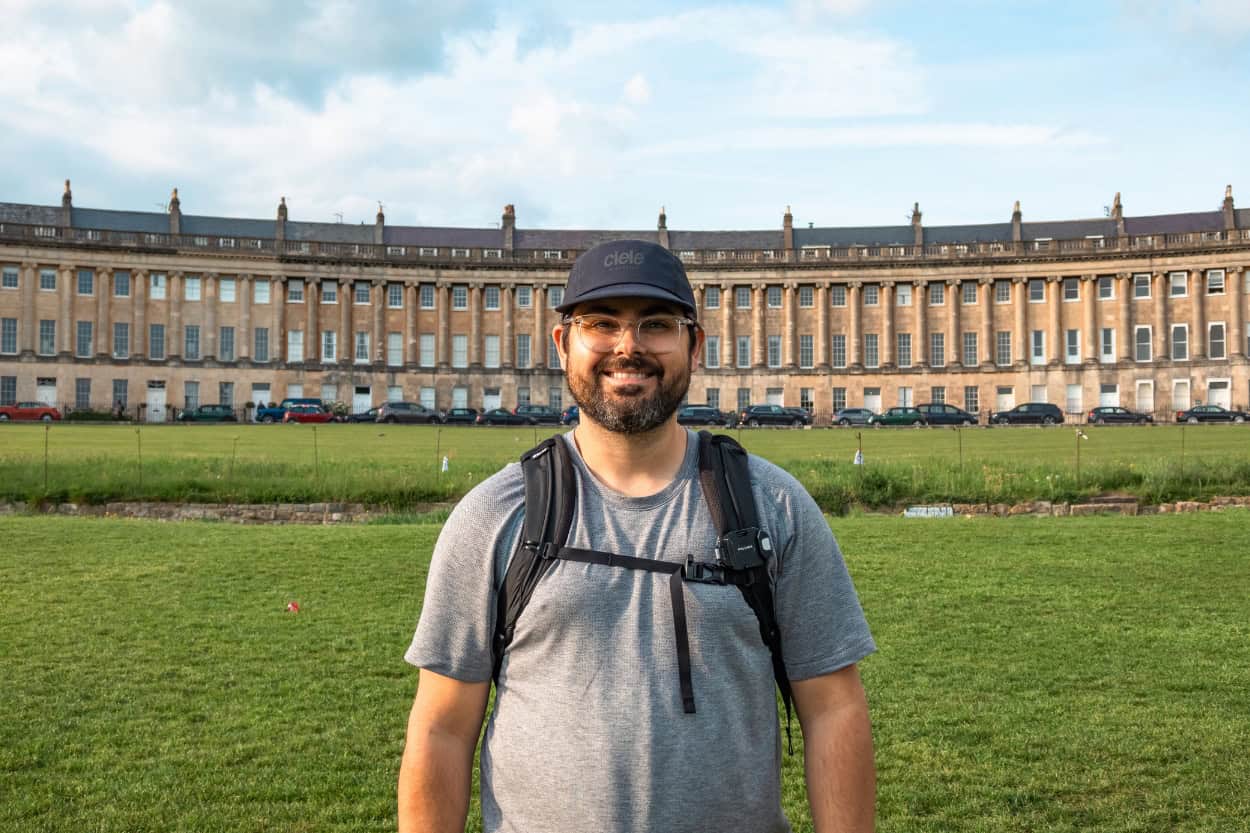 Man standing in front of the Royal Crescent walking the Cotswolds in Bath