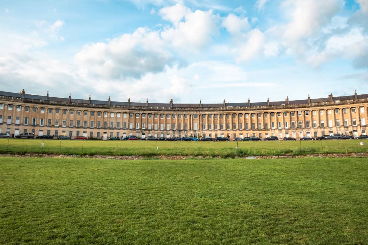 The Royal Crescent in Bath, England glowing gold at sunset