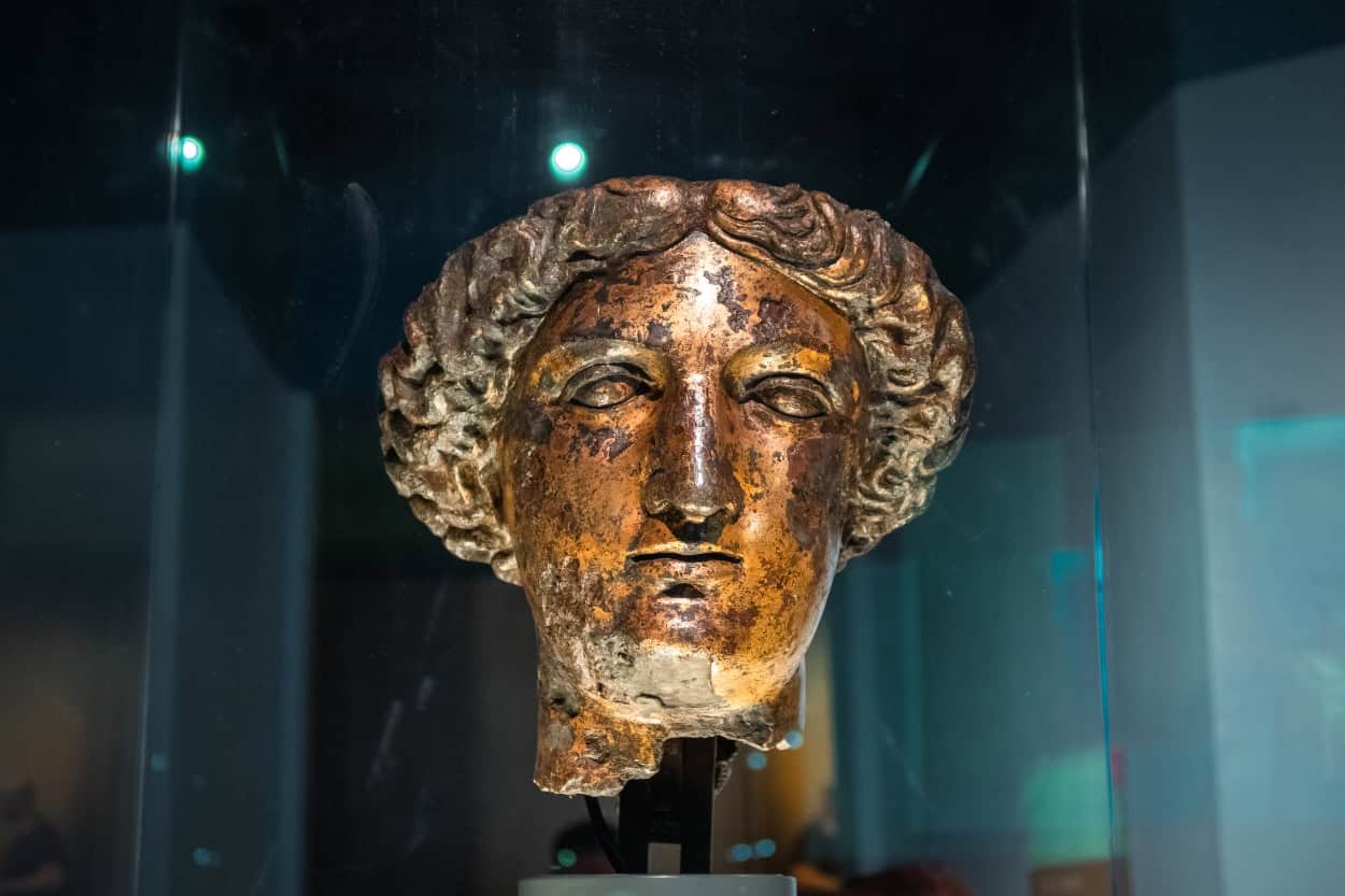 Bust of the goddess Sulis Minerva on display inside the Roman Baths museum