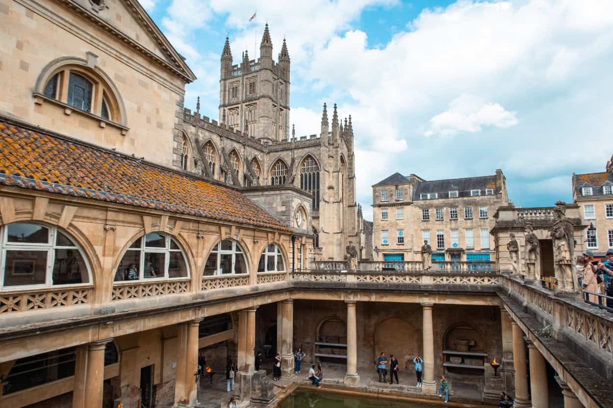 Open-air view of Bath Abbey from the Roman Baths upper terrace, Bath, England