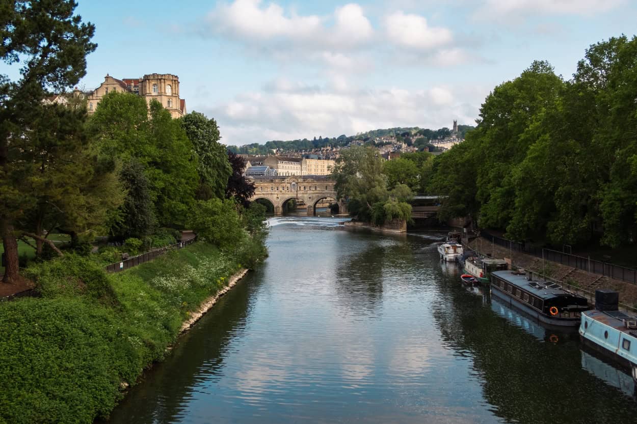 Boats lined up along the River Avon Trail near the Recreation Ground, Bath
