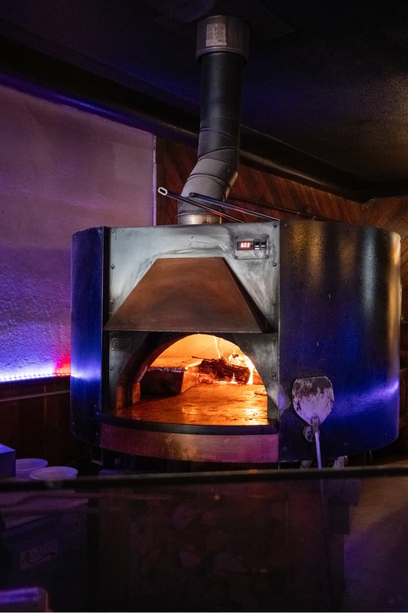 Wood-fired pizza oven at Purple Pig Pizzeria in Alamosa, Colorado
