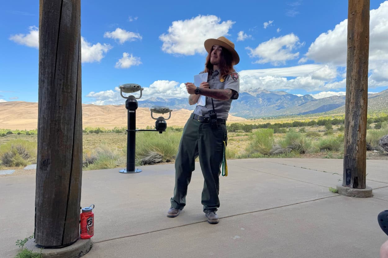 Park ranger leading a bird talk at Great Sand Dunes National Park in Colorado