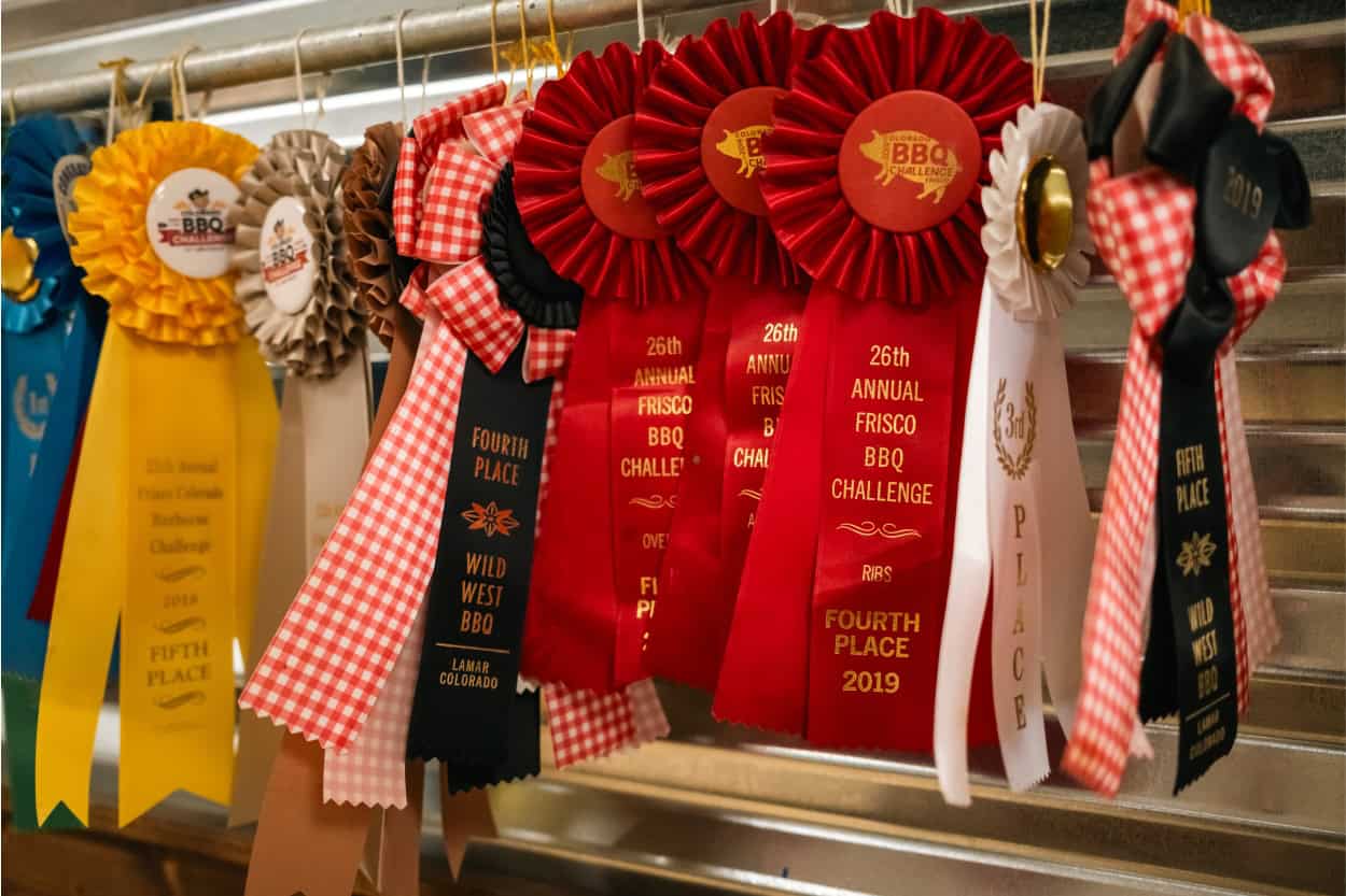 Award ribbons displayed at Woody's Q Shack in Alamosa, Colorado