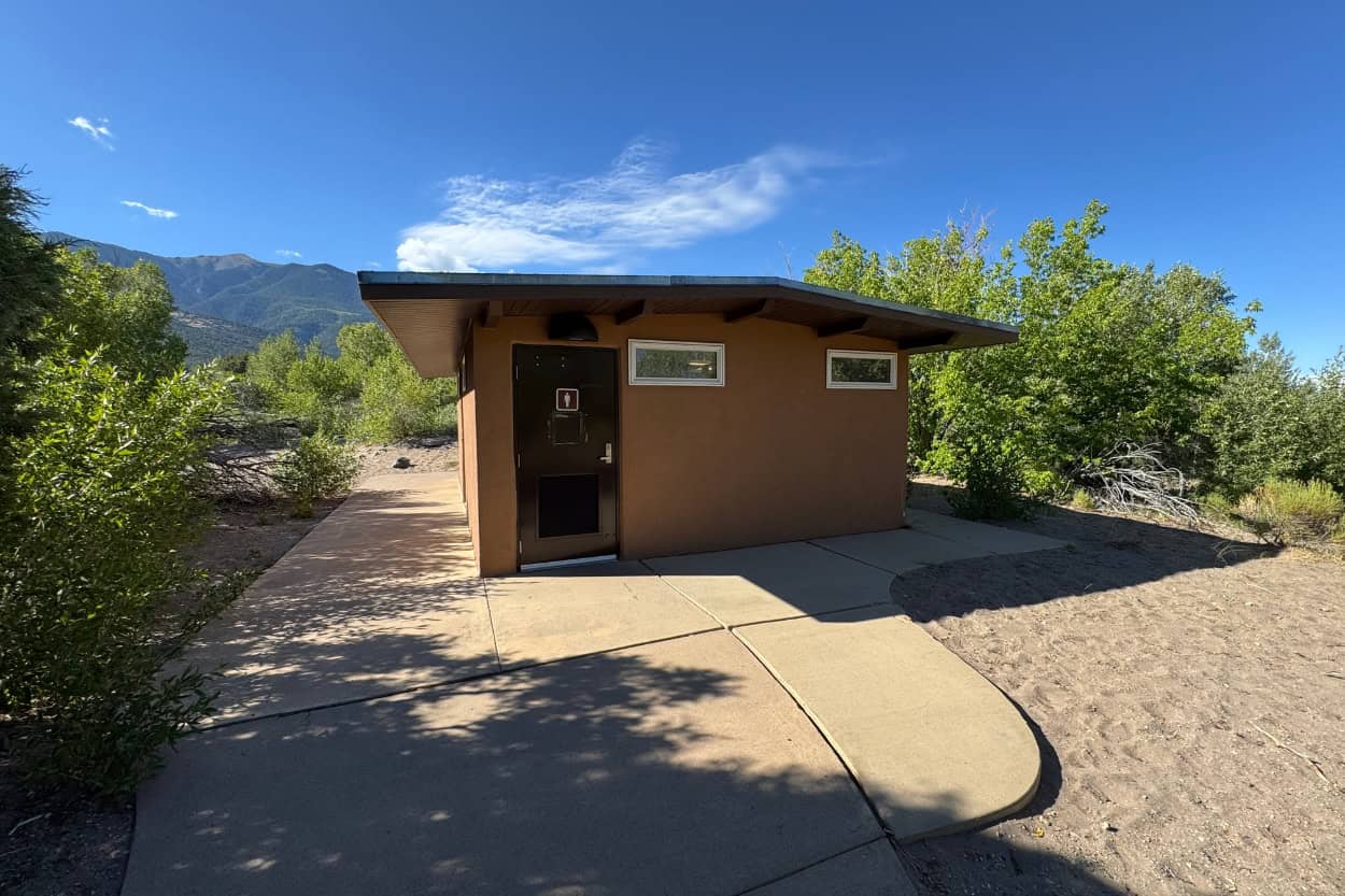 Exterior of the picnic area bathroom at Great Sand Dunes National Park