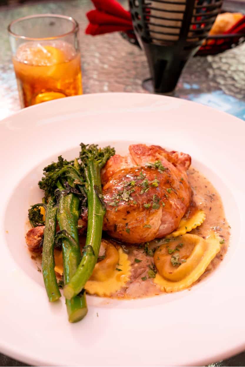 Duck confit over ravioli with broccolini at Friar's Fork in Alamosa