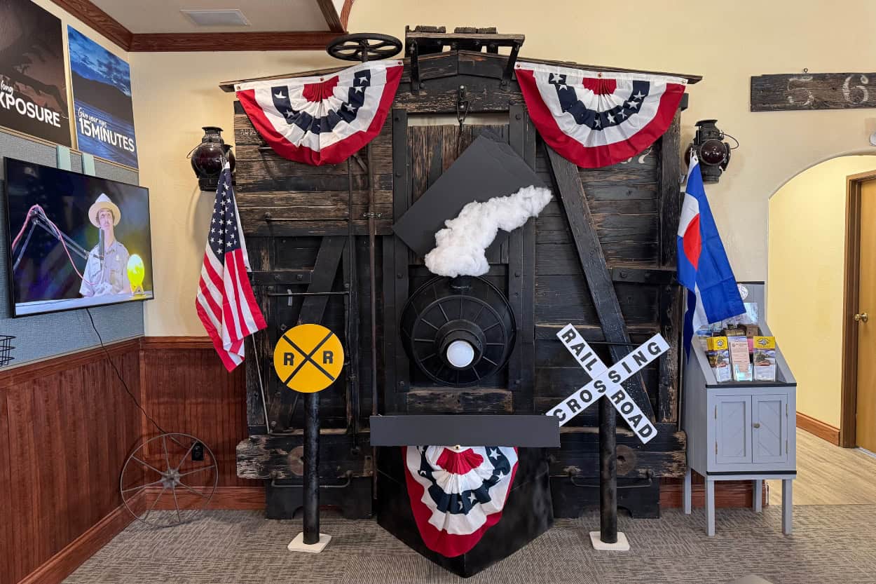 Train-shaped photo display inside the Alamosa Visitor Center in Colorado