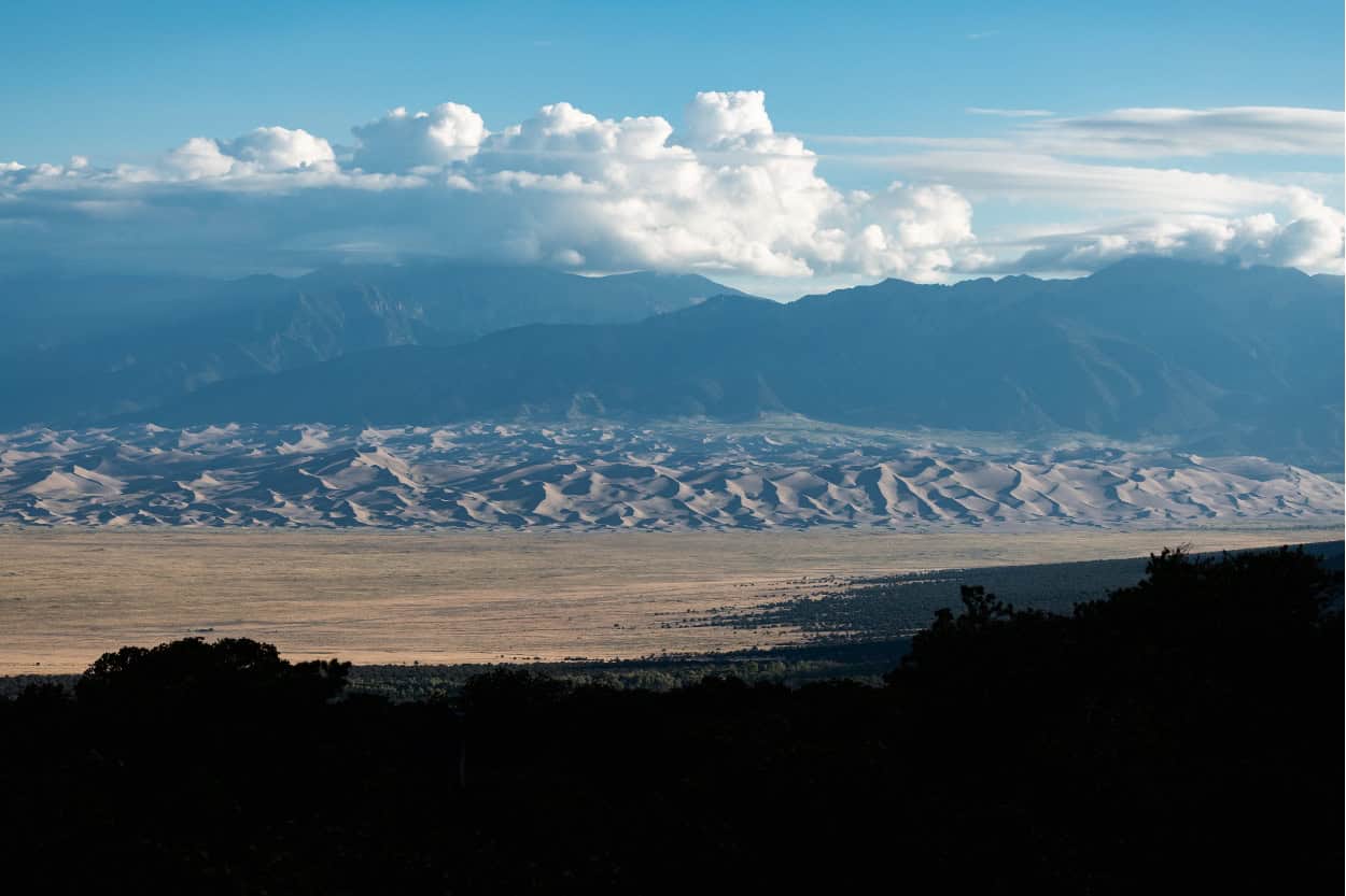 Campsite view overlooking Great Sand Dunes National Park and the San Luis Valley in Colorado